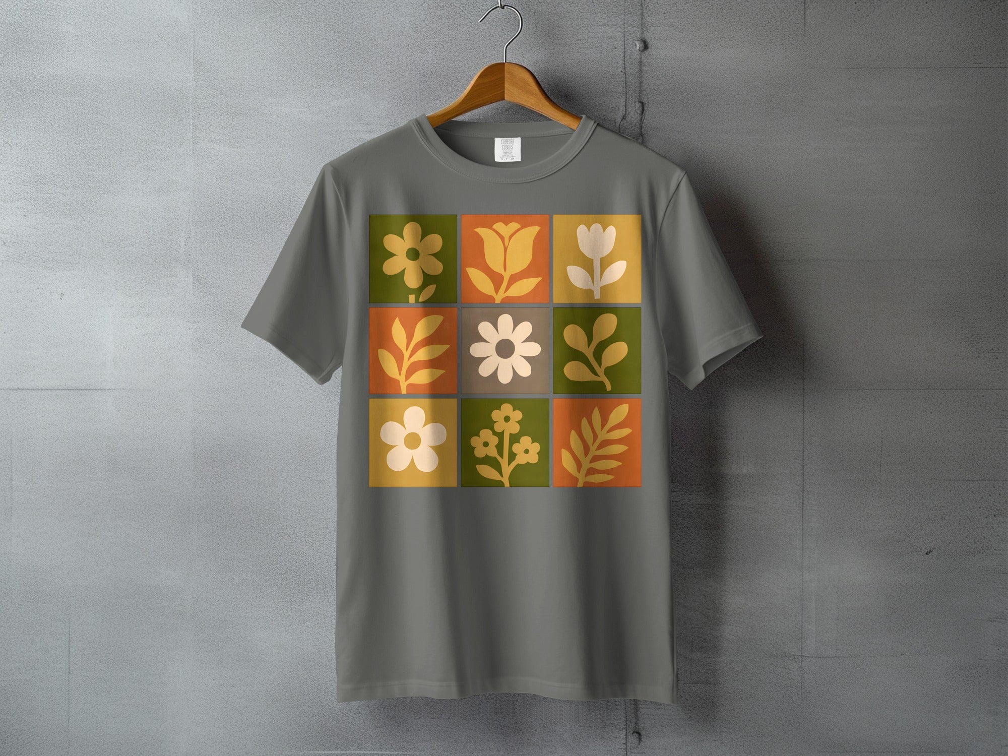 Retro Botanical Square Grid Design Grey Shirt product type
Retro
Floral
Botanical
Geometric
Vintage
Boho
Flower
Pattern
Art
Design
Midcentury
70s style
Grey tee
Mustard color
Olive green
Burnt orange
Cream white
Abstract flora
Nature inspired
Square grid