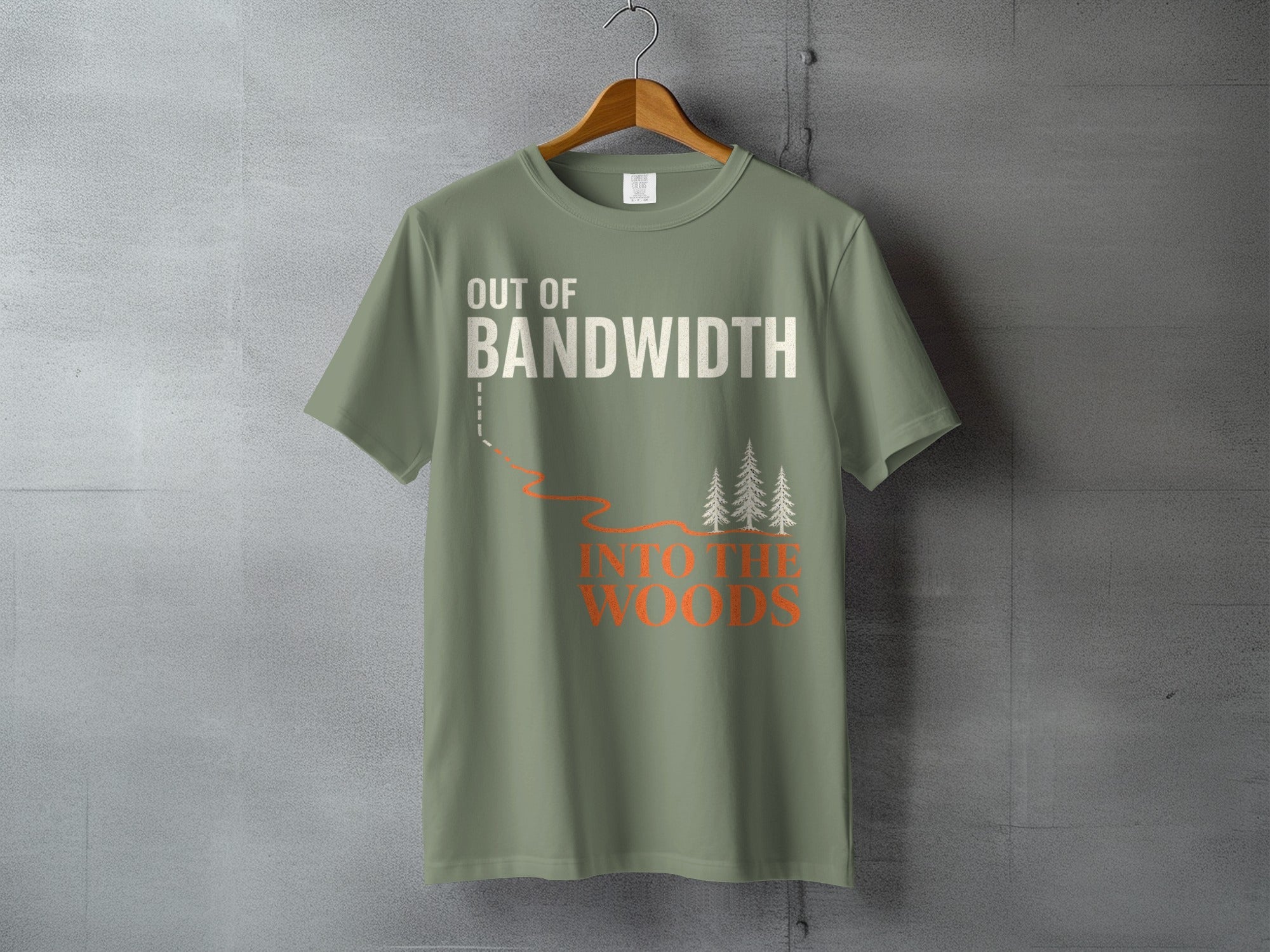 Green t-shirt with "OUT OF BANDWIDTH INTO THE WOODS" text and graphic.