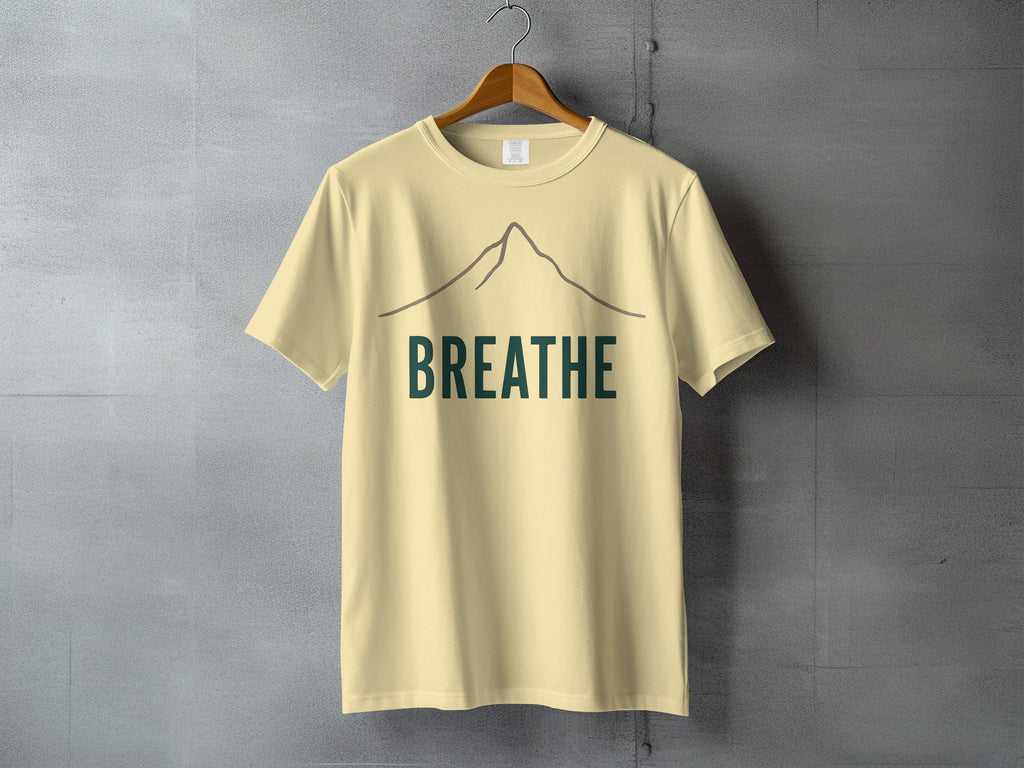 Mountain BREATHE design light yellow product type
Mountain Graphic, BREATHE Text, Yellow Tee, Cream Color, Nature Design, Outdoor Theme, Relaxation, Mindfulness, Wellness Art, Simple Style, Minimalist Look, Inspirational, Adventure Spirit, Peace Calm, Graphic Print, Uplifting Message, Earthy Tones, Mountain Peak, Positive Vibe, Graphic Top