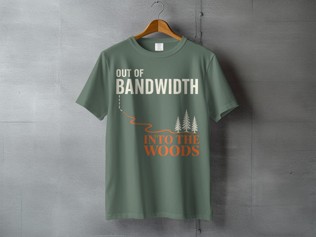 Green t-shirt with "OUT OF BANDWIDTH INTO THE WOODS" text and pine trees graphic.