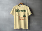 Light yellow t-shirt with "Out of Bandwidth Into The Woods" text and forest graphic.