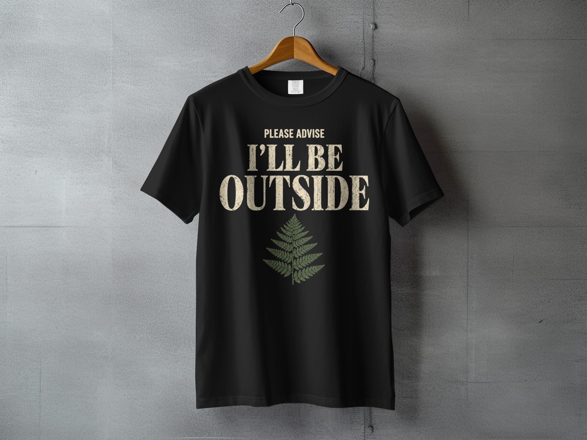 Black t-shirt with text "PLEASE ADVISE I'LL BE OUTSIDE" and a fern graphic.