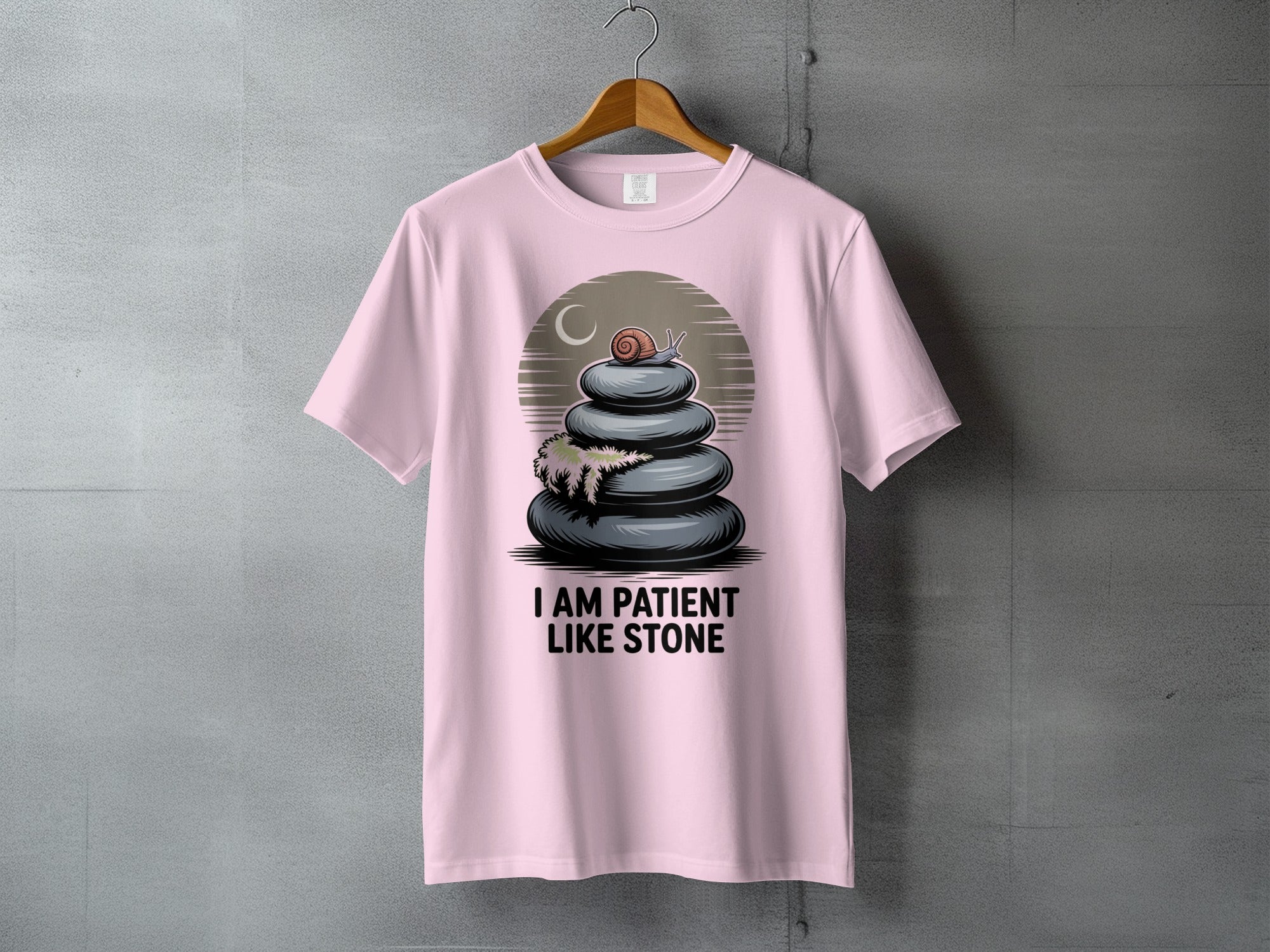 Snail Stone Stack Patience Zen Moon I AM PATIENT LIKE STONE product type
Snail tee
Patience quote
Zen design
Stacked stones
Moon graphic
Calm apparel
Serenity shirt
Motivational tee
Spiritual gift
Meditation top
Nature theme
Slow living style
Mindful wear
Unique graphic
Positive message
Pink t-shirt
Inspiring quote
Balance art
Stone cairn
Relaxed fit
