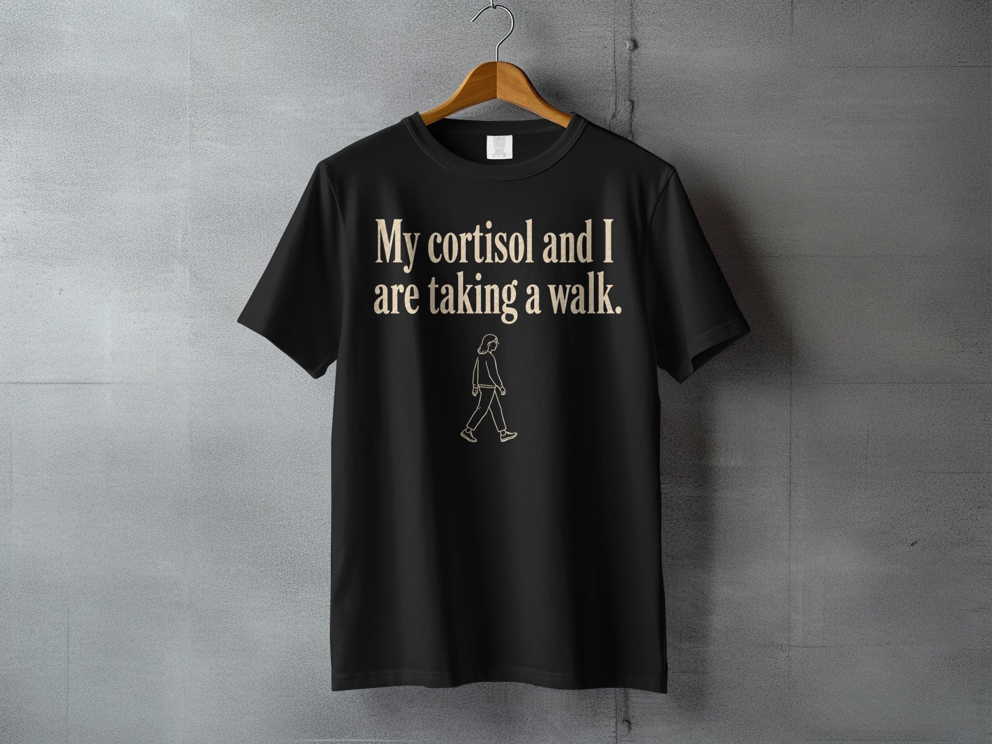Black t-shirt with text "My cortisol and I are taking a walk."