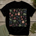 Black t-shirt with a folk art berry and floral vine pattern.