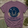 T-shirt with meditating figure and text "Quiet is a superpower".