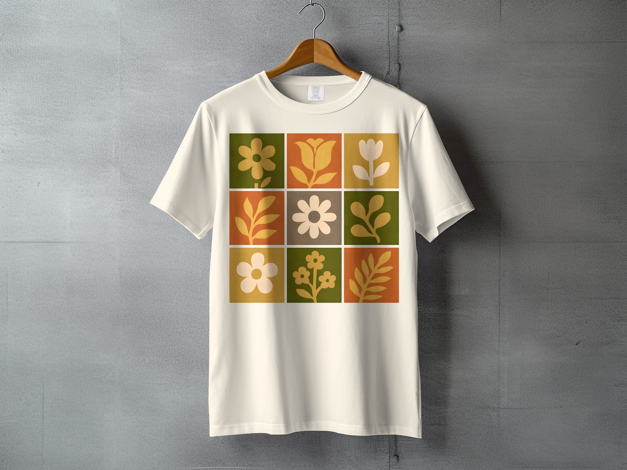 Retro Floral Grid Design Block Pattern T-Shirt product type
Floral, Retro, Vintage, Botanical, Flower Print, Earthy Tones, Block Pattern, Geometric Design, Nature Inspired, Hippie Chic, Groovy Style, Daisy Motif, Leaf Print, Abstract Art, Graphic T-shirt, Apparel, Fashion, Cream Shirt, Mod Style, Bohemian Vibe