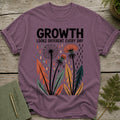 T-shirt with "Growth Looks Different Every Day" text and dandelion graphic.