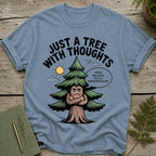 Blue t-shirt with grumpy tree graphic reading "Just a tree with thoughts."