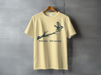Light yellow t-shirt with a bird on a branch graphic and text.