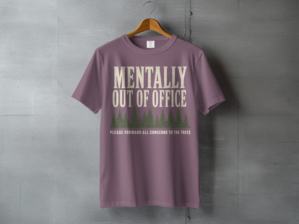 Purple t-shirt with "Mentally Out Of Office" and forest graphic.