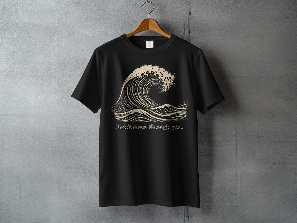 Black t-shirt with a stylized wave graphic and the text "Let it move through you."