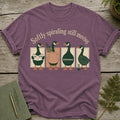 T-shirt with four geese, text "Softly spiraling still moving," and individual goose descriptions.