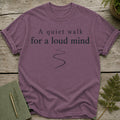 Purple t-shirt with "A quiet walk for a loud mind" text and winding path.