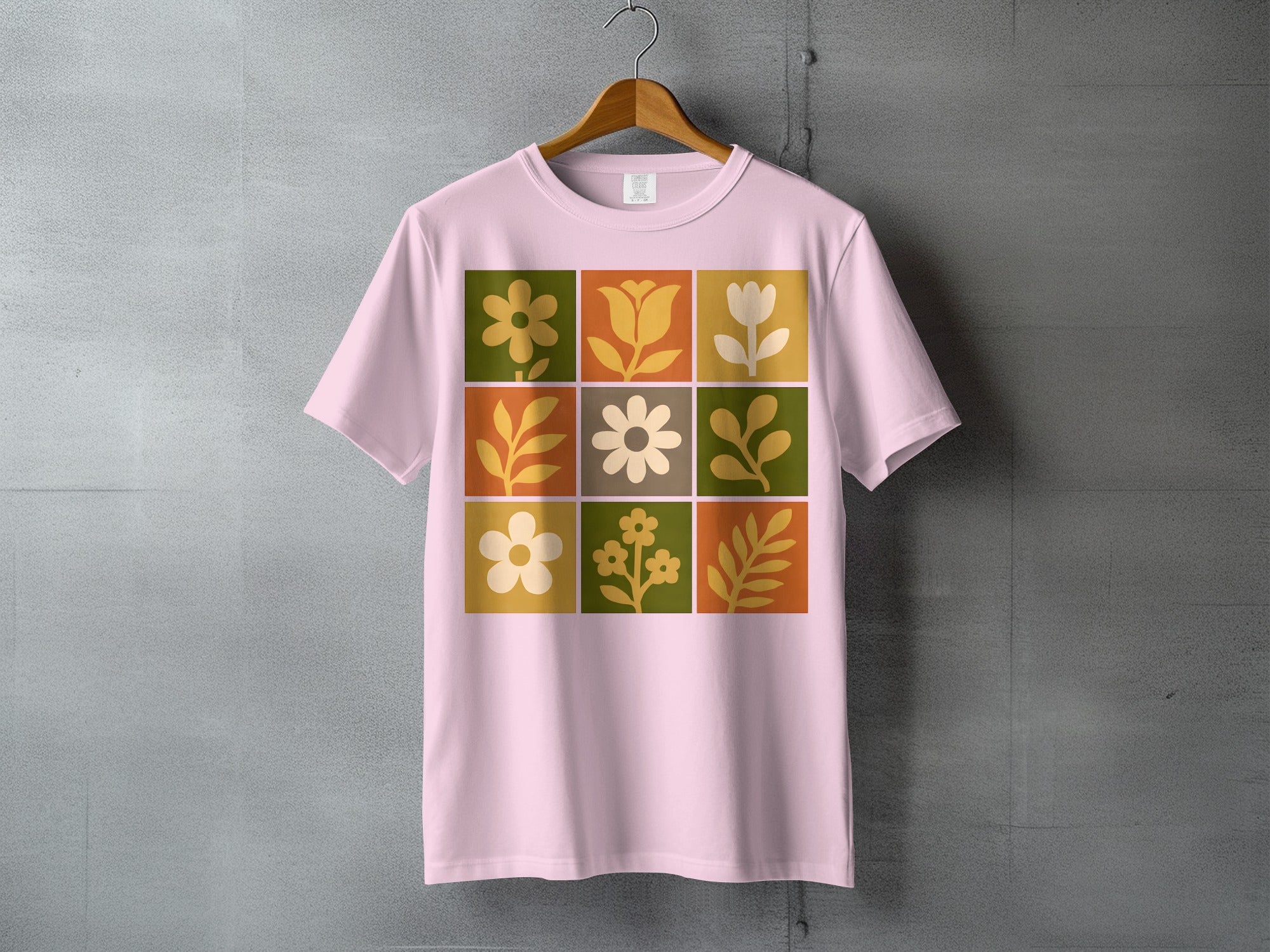 Pink Floral Grid Design Retro Style Square Pattern product type
pink shirt, floral design, retro style, grid pattern, botanical art, flower power, garden motifs, earthy colors, vintage inspired, square print, graphic shirt, nature aesthetic, blossoms, leaf patterns, artistic print, casual fashion, summer style, spring collection, unique design, apparel