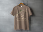 Taupe t-shirt with a bird and branch graphic and text "In The Moment The Rest Can Wait".