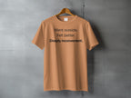 Orange t-shirt with black text reading "Went outside. Felt better. Deeply inconvenient."