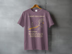 Purple t-shirt with "I went for a walk returned marginally improved" text and graphic.