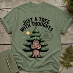 Green t-shirt with a cartoon tree that says "Just a Tree With Thoughts".