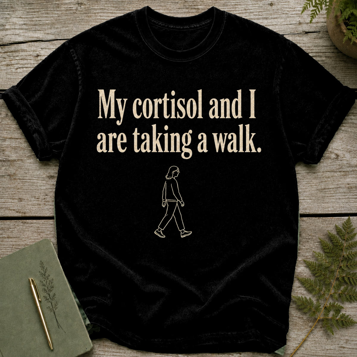 Black t-shirt with text "My cortisol and I are taking a walk."