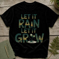 Black t-shirt with "Let it Rain, Let it Grow" text and seedling graphic.