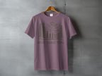 Purple t-shirt with forest and mountain graphic and text "Nature. Because People."