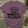 T-shirt with "Namaste.. Away From Me" text and a lotus flower graphic.
