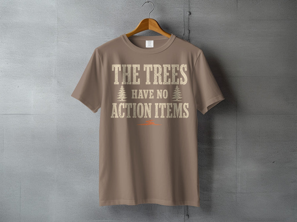 Brown t-shirt with text "THE TREES HAVE NO ACTION ITEMS" and tree graphics.