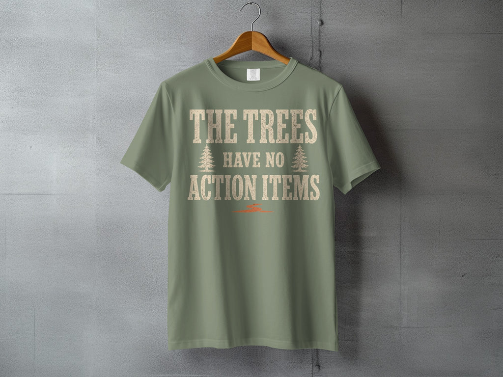 Sage green t-shirt with text "THE TREES HAVE NO ACTION ITEMS".