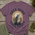 Purple t-shirt with owl graphic and text "FREE MIND SINCE ALWAYS".