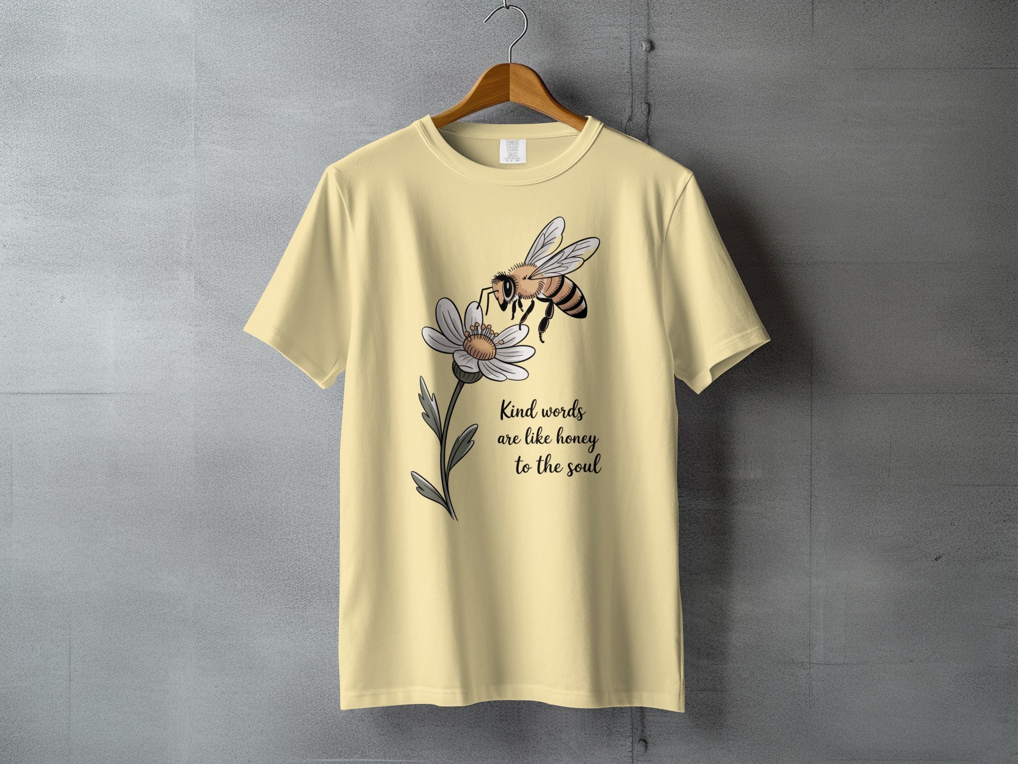 Kind words are like honey to the soul bee flower product type
T-shirt, Bee shirt, Flower tee, Kind words quote, Inspirational top, Honey soul design, Daisy graphic, Nature aesthetic, Insect apparel, Positive tee, Graphic print, Yellow t-shirt, Cream colored, Aesthetic shirt, Summer fashion, Animal motif, Floral art, Unisex clothing, Soul quote, Uplifting message