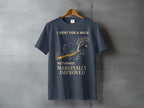 Dark blue t-shirt with text "I WENT FOR A WALK RETURNED MARGINALLY IMPROVED".
