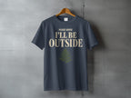 Dark grey t-shirt with "PLEASE ADVISE I'LL BE OUTSIDE" and fern graphic.