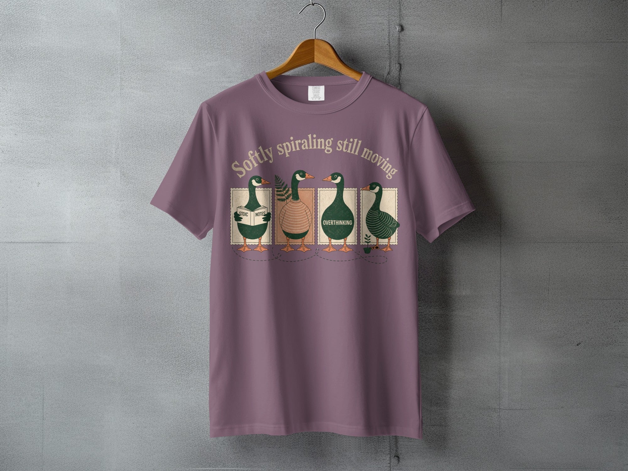 Four cartoon geese wearing vests stand on a line, t-shirt graphic.