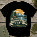 Black t-shirt with "Somewhere With No Notifications" text and a nature scene.