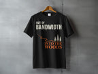 Black t-shirt with "OUT OF BANDWIDTH INTO THE WOODS" text and pine trees graphic.