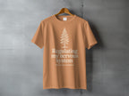 Orange t-shirt with a pine tree graphic and "Regulating my nervous system" text.