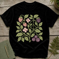 Black t-shirt with a floral design featuring strawberries, berries, flowers, and a peace sign.