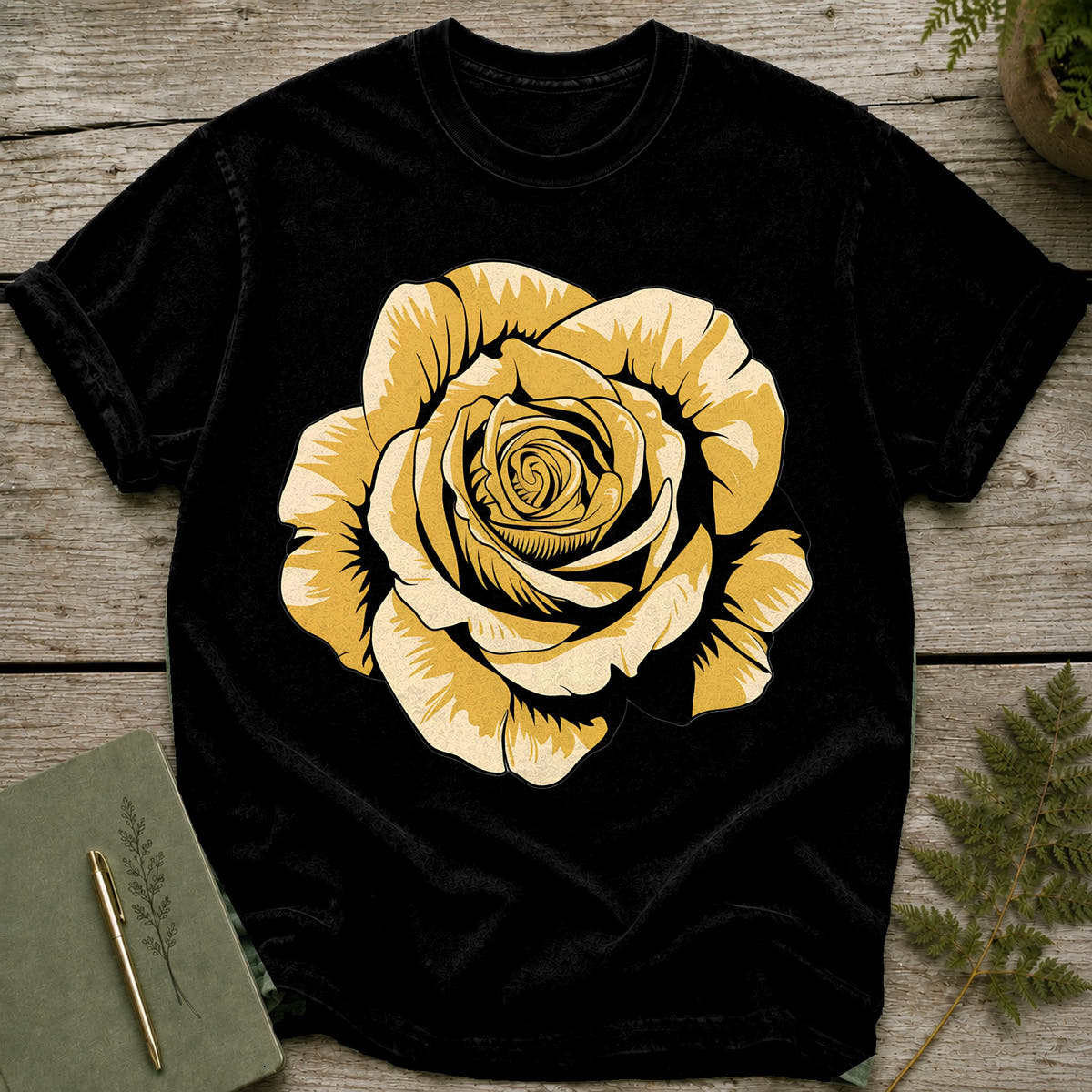 Black t-shirt with a large, stylized yellow rose graphic on the front.