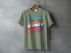 Currently Not Giving A Damn Colorful Grunge Design product type
Currently Not Giving A Damn
Attitude Tee
Sarcastic Shirt
Humorous Apparel
Grunge Design
Distressed Text
Colorful Graphic
Brush Stroke Font
Statement Shirt
Expressive Top
Olive Green Shirt
Green Tee
Unique TShirt
Bold Graphic
Funny Slogan
Casual Wear
Everyday Top
Unisex T-Shirt
Fashion Apparel
Pop Culture Tee