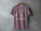 T-shirt with bird and branch graphic, text "In the moment the rest can wait."