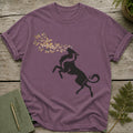 Purple t-shirt with a black wolf silhouette exhaling golden butterflies.