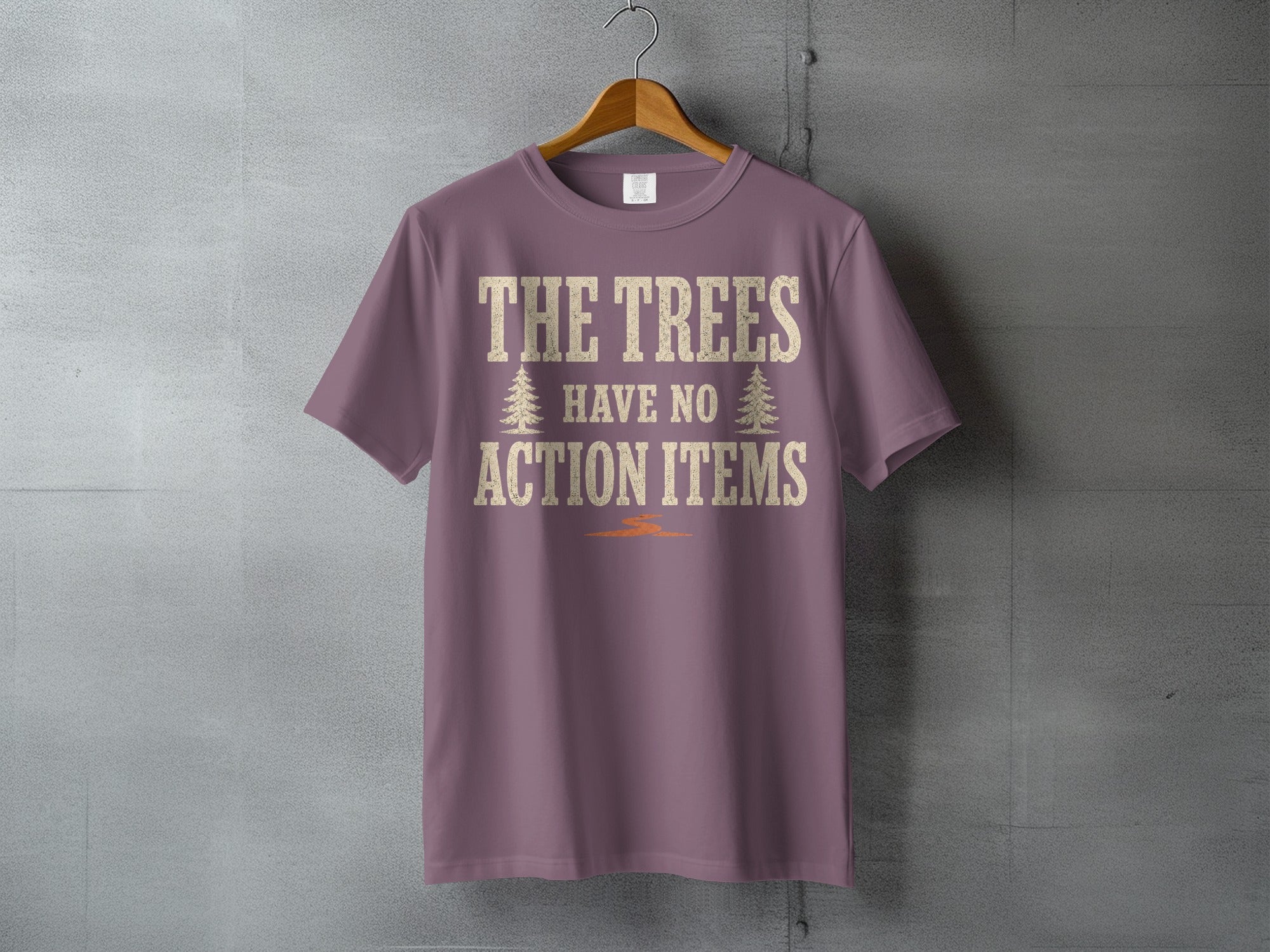 Purple t-shirt with distressed text "THE TREES HAVE NO ACTION ITEMS".