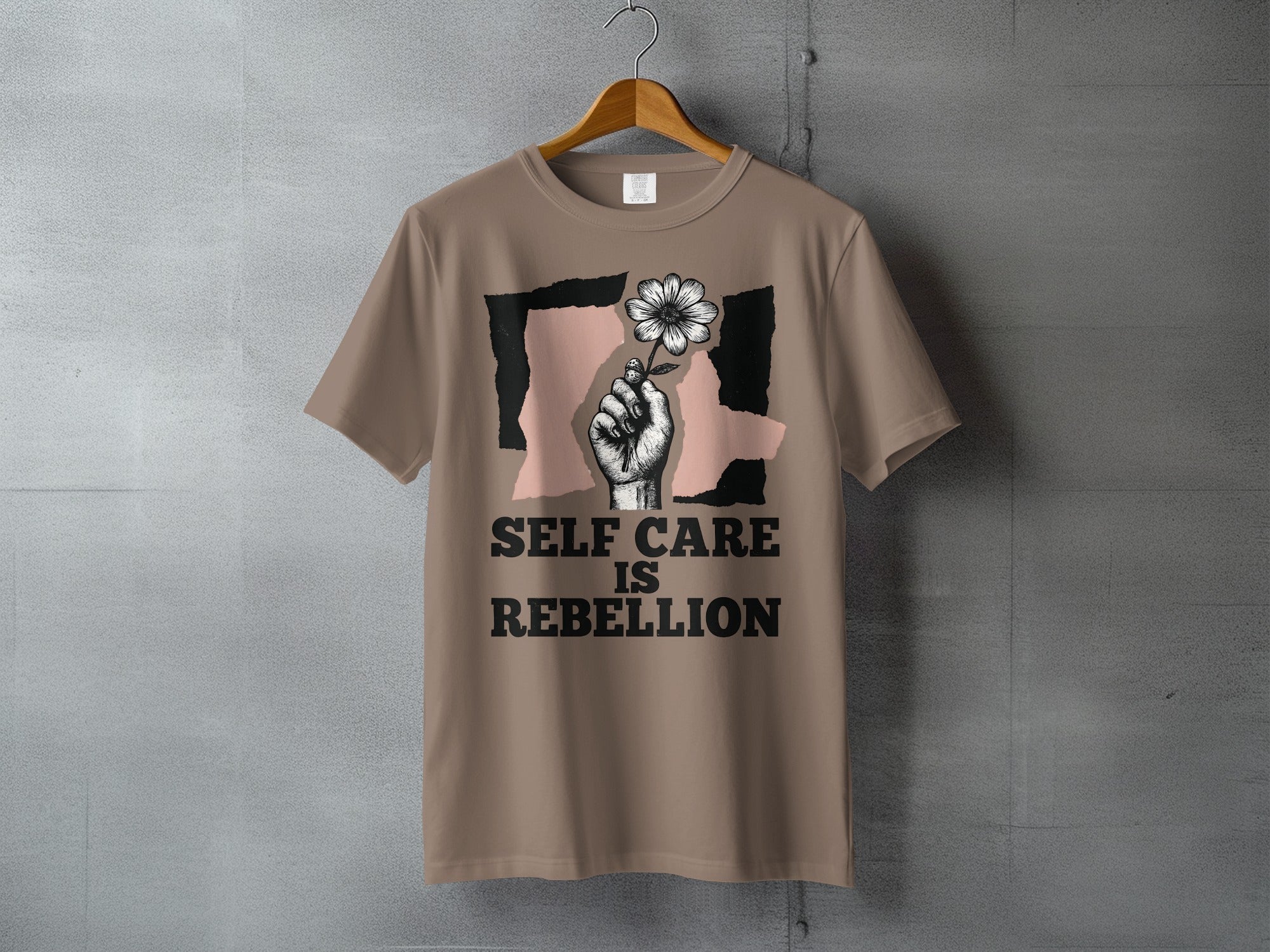 Self Care Is Rebellion Hand Flower Design product type
Self Care
Rebellion
Flower Design
Graphic Tee
Statement Shirt
Empowerment
Mental Health
Positive Message
Floral Print
Unique Design
Inspirational
Activism Apparel
Self Love
Grunge Aesthetic
Beige Shirt
Protest Art
Daisy Motif
Gift Idea
Everyday Style
Comfort Wear