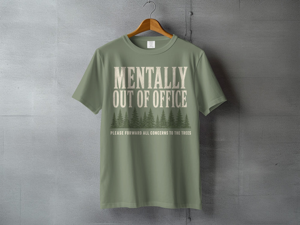 Green t-shirt with "MENTALLY OUT OF OFFICE" and trees graphic.
