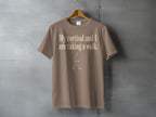 Tan t-shirt with "My cortisol and I are taking a walk" text and walking figure.