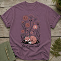 T-shirt with sleeping fox and flowers, reads "Let it grow wild."