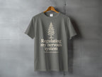 Gray t-shirt with a pine tree and text "Regulating my nervous system Poorly, but outdoors."