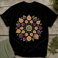 Black t-shirt with a mandala design of figs and leaves.