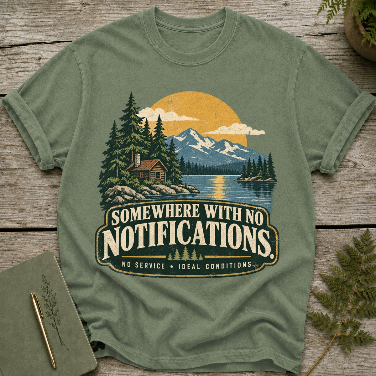 T-shirt with "Somewhere with No Notifications" text and a nature scene.